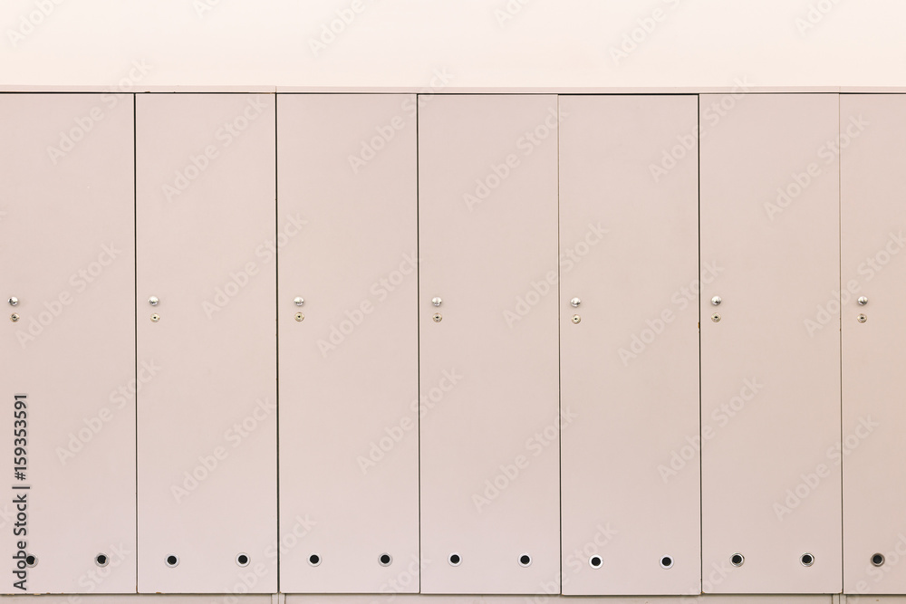 Closet in the corridor in front of white wall