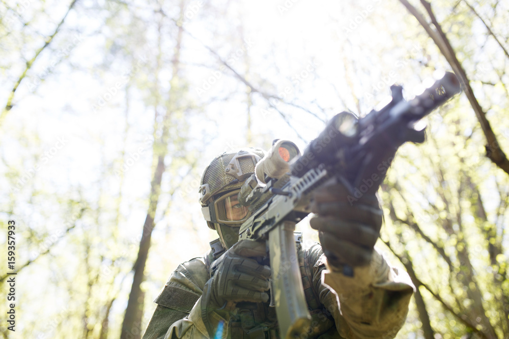 Portrait of soldier with gun Portrait of soldier with gun