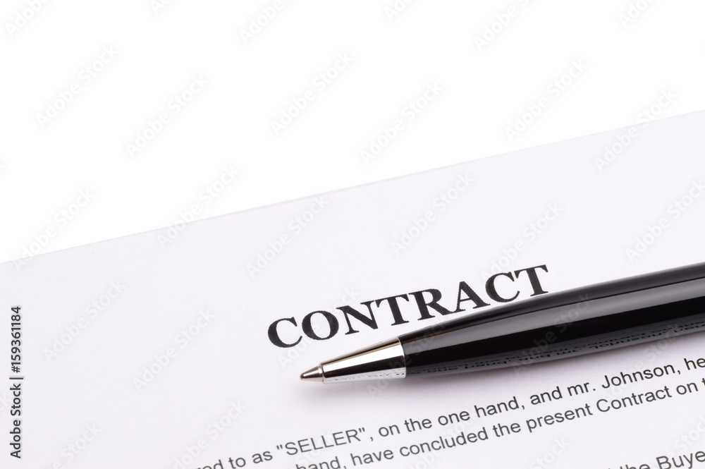 Close-up of pen on contract