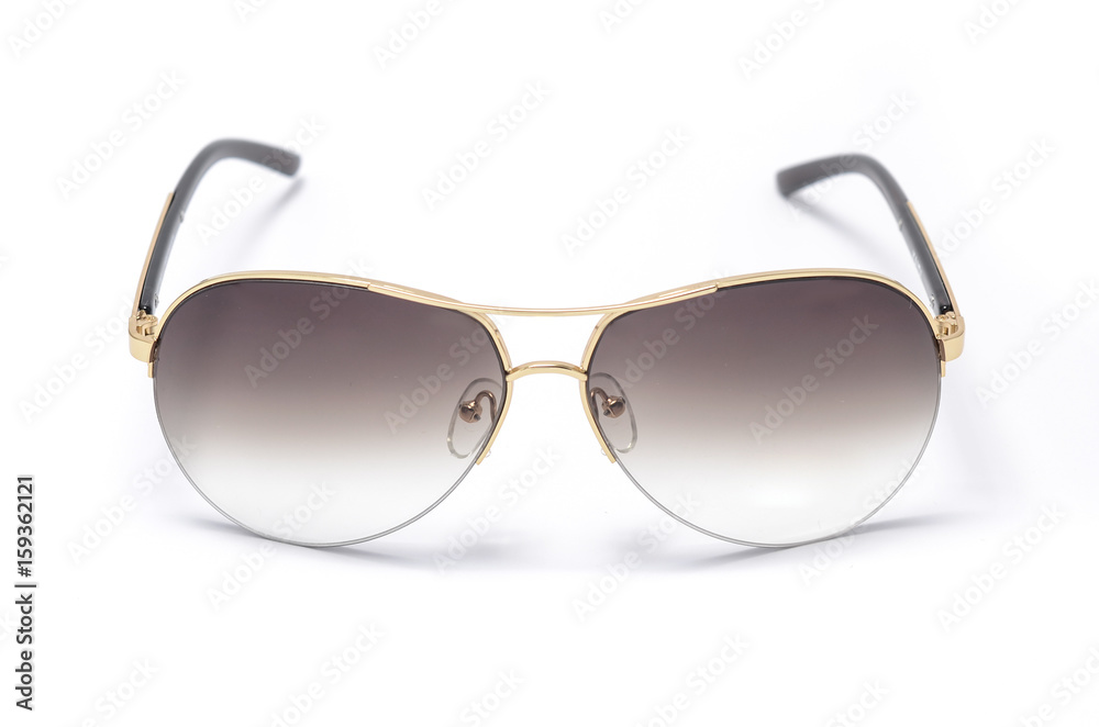 Sunglasses in an iron frame with brown glass isolated on white Sunglasses in an iron frame with brown glass isolated on white