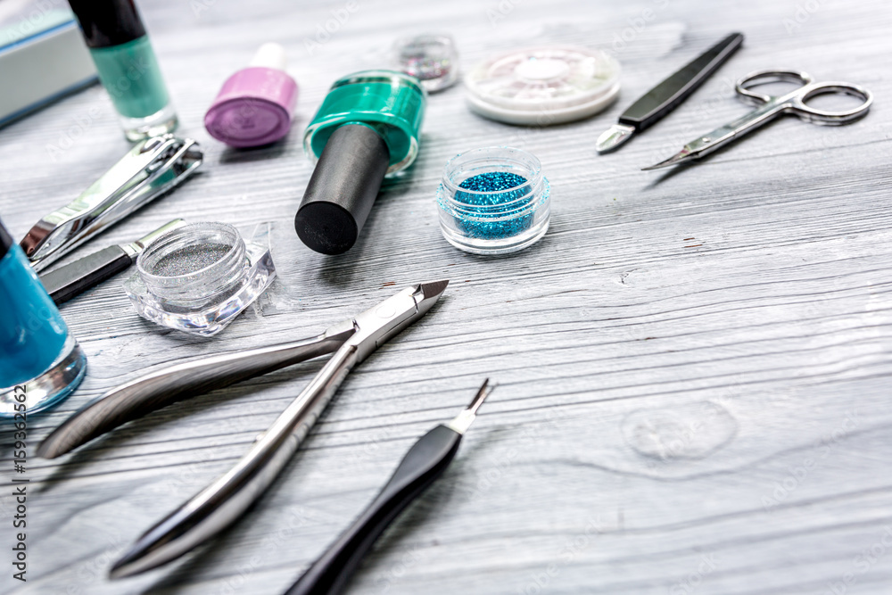 manicurist work with manicure set and nail polish for hands care gray background mock up manicurist work with manicure set and nail polish for hands care gray background mock up