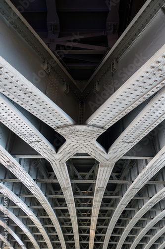 Parallel joined steel beams supporting bridge span