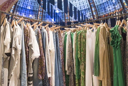 Canvas Print Women clothes in front with store background in Paris