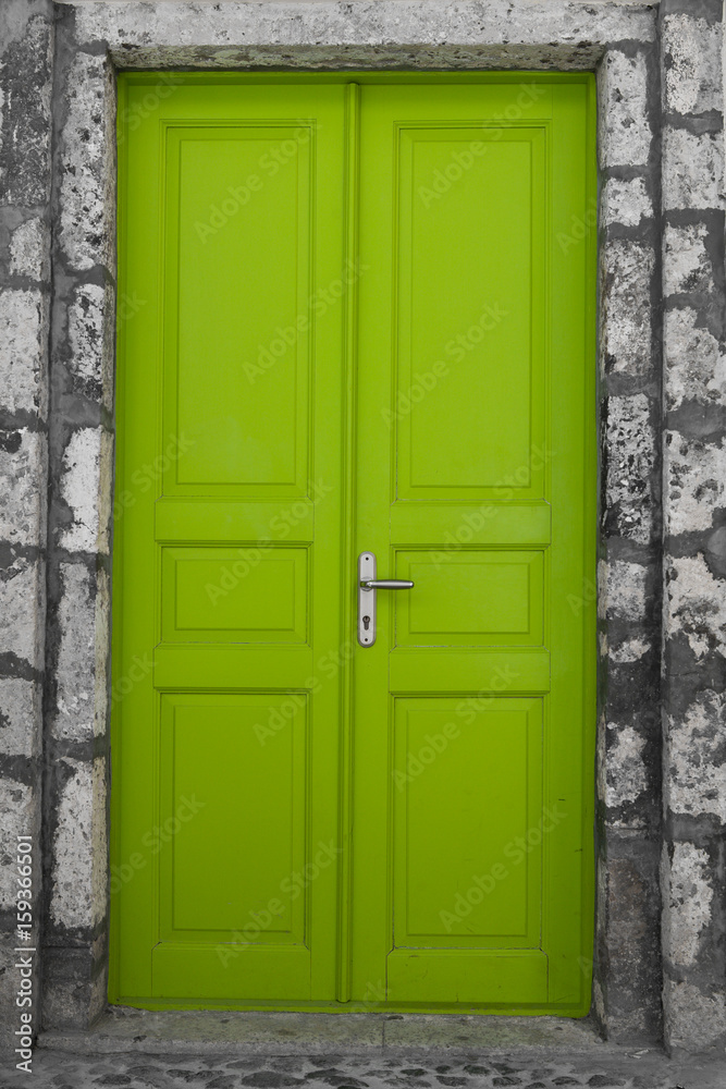 Green door in an old building