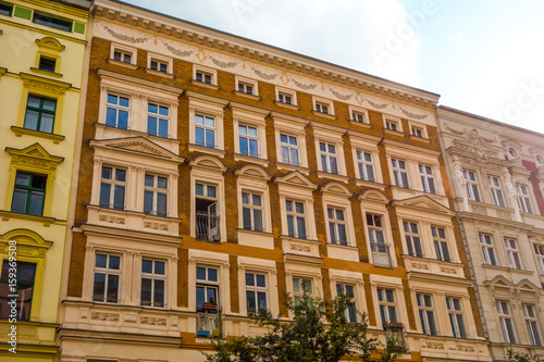 warm colored brick facade of townhouse buildings at berlin