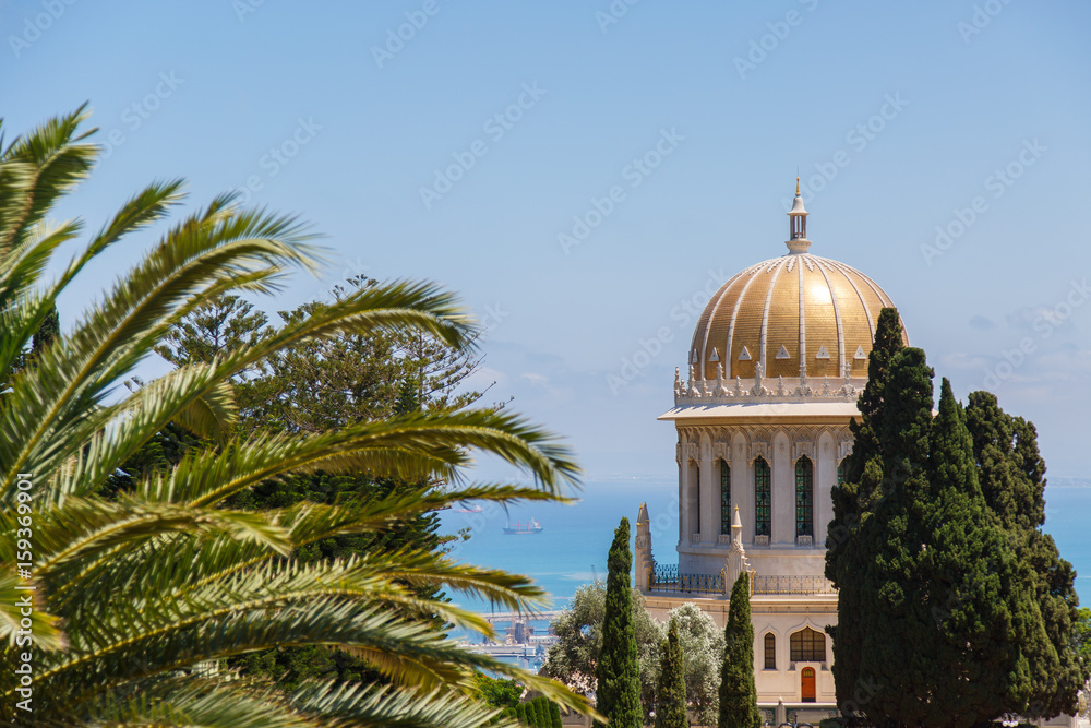 Bahai Garden in Haifa, Israel. Beautiful geometric garden. Dome behind a tree