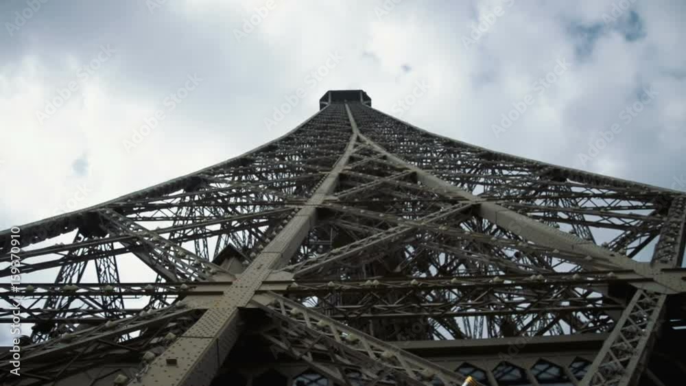 Eiffel Tower, Paris, France, Europe. View of the famous travel and tourism icon at daytime in summer spring with blue sky, Eiffel Tower, Paris, France, Europe. View of the famous travel and tourism icon at daytime in summer spring with blue sky,