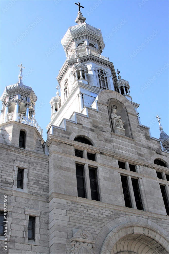 Fototapeta premium Beautiful view of architectural detail of top of Church of Ste. Anne des Plaines, Quebec