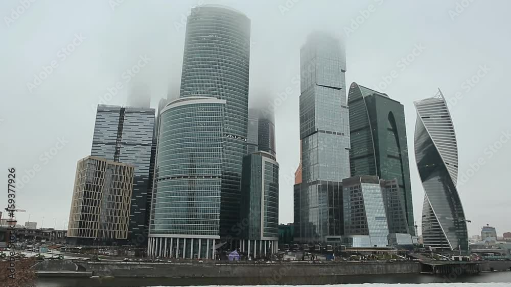 Moscow. New architectural high-rise buildings. Evolutionary tower in the financial and office center of Moscow City. Overcast. Skyscrapers in the fog. Moscow. New architectural high-rise buildings. Evolutionary tower in the financial and office center of Moscow City. Overcast. Skyscrapers in the fog.