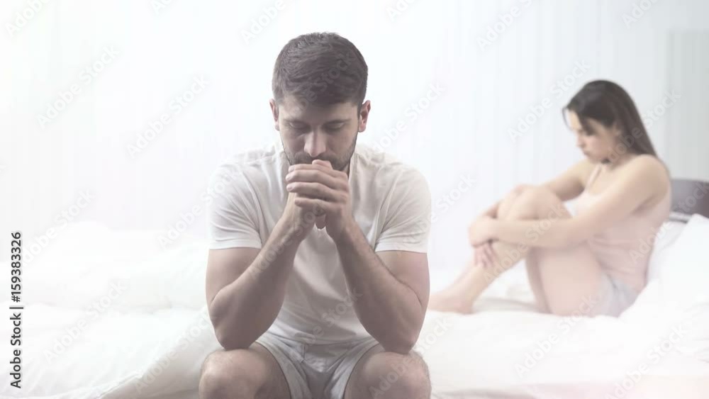 The young man and woman sleeping on the bed The young man and woman sleeping on the bed