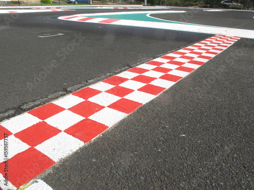 finish line in finish racetrack, red and white color © TANIDA