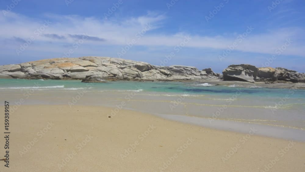 White Wild Mediterranean Sea Beach in Italy with Clear Blue Water and Rocks White Wild Mediterranean Sea Beach in Italy with Clear Blue Water and Rocks