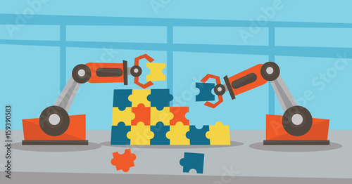 Two robotic arms building a colorful puzzle.