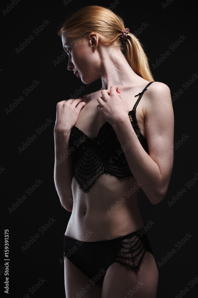 Fototapeta premium Sexy girl in underwear posing in studio