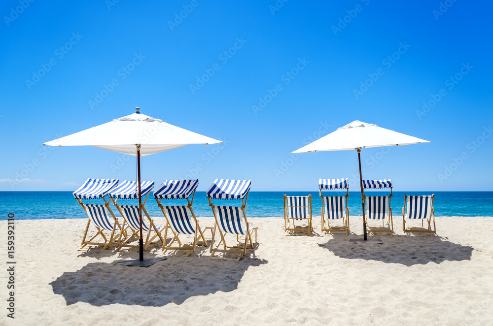 Fototapeta premium Beach chairs near the ocean background