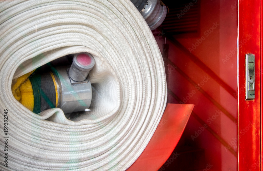 Roll of canvas hose in the emergency firefighting box Roll of canvas hose in the emergency firefighting box
