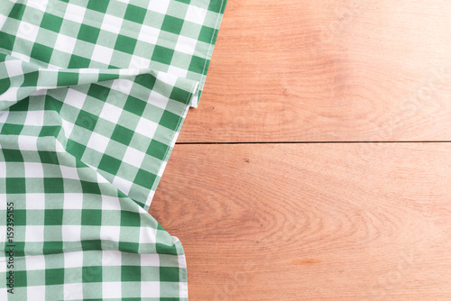 Tablecloths on the wooden table background