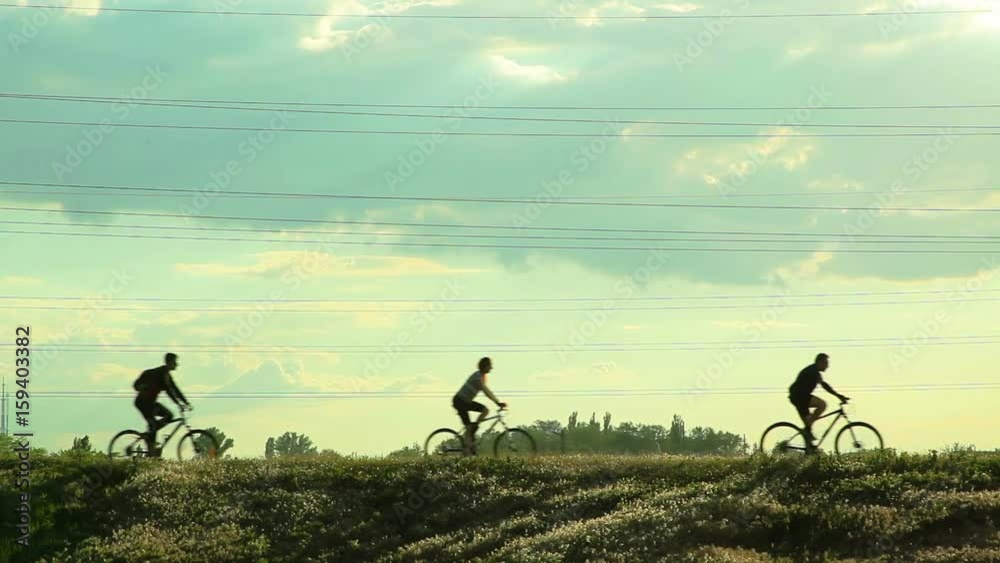 Cyclists riding bicycles
