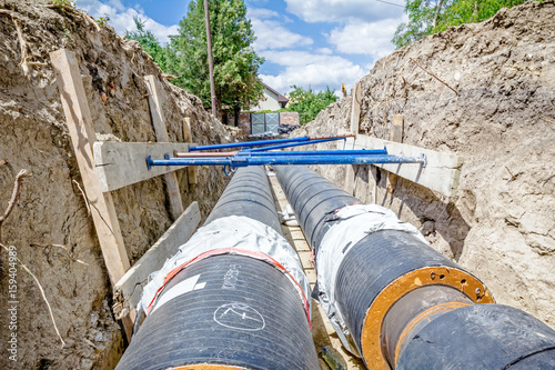 Shoring supports walls of a trench to protect workers photo