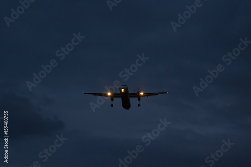 The plane lands at night