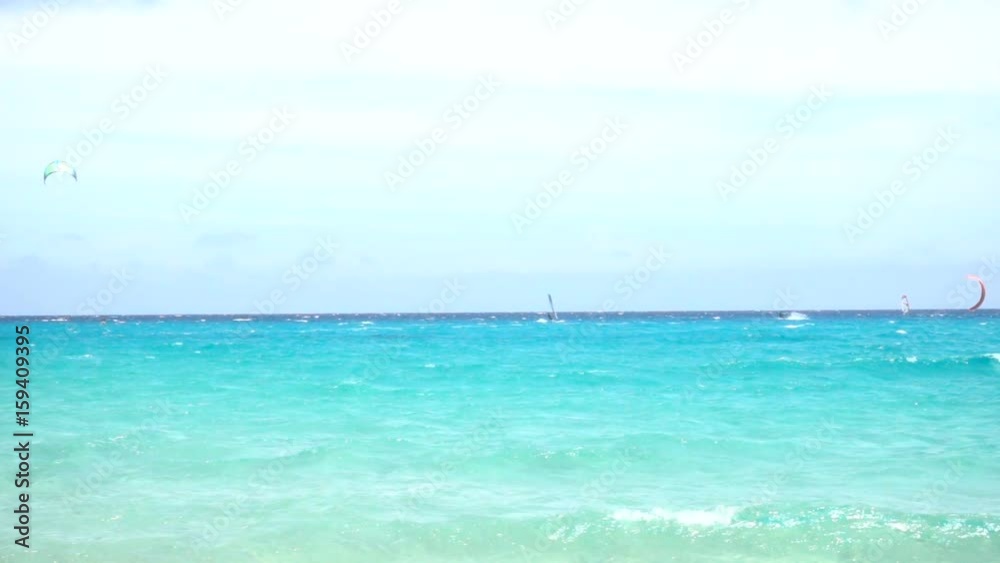 Kitesurfing and WIndsurfing in a Windy Bay in Slow Motion Kitesurfing and WIndsurfing in a Windy Bay in Slow Motion
