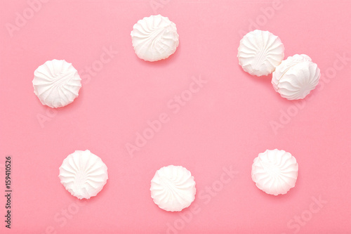 Marshmallows on pink background. Zephyr on pink background.
