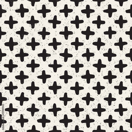 Hand drawn style ethnic seamless pattern. Abstract geometric tiling background in black and white. Vector freehand doodle texture. © Samolevsky