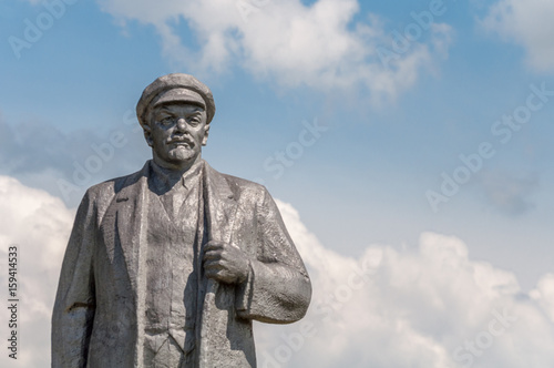 Kremenivka, Ukraine - May 21, 2017: The monument to Vladimir Lenin, the Soviet leader. Stone statue with a view to the sky. Back view.