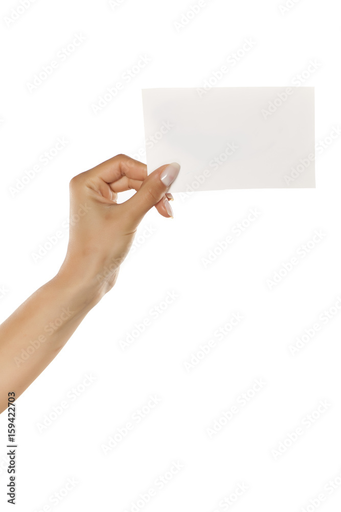 female hand holding paper