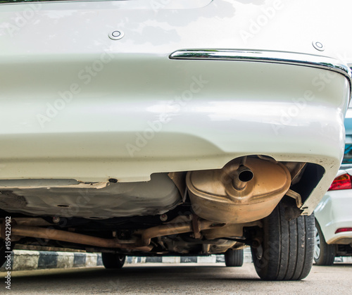 exhaust pipe of a white car