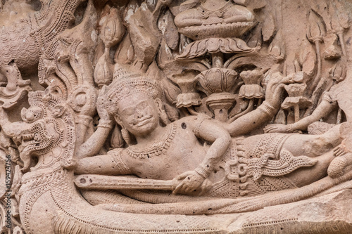 Narai Banthom Silp bas-relief sculpture at Khao Panom Rung, Thailand photo