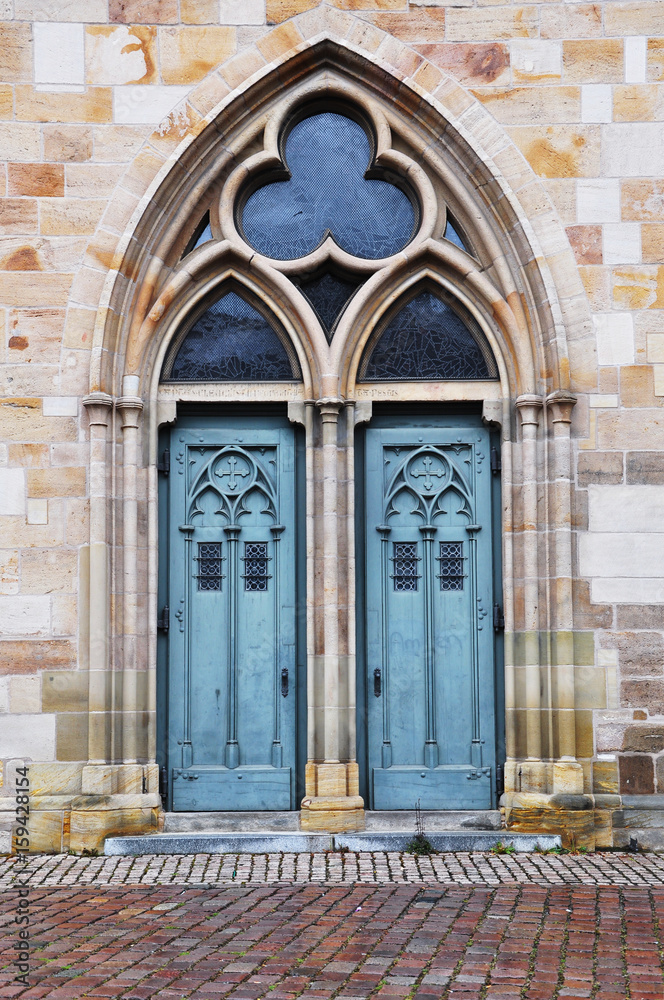 Arched beautiful gothic door of the City Temple in Esslingen, Baden-Wurttemberg, Germany.