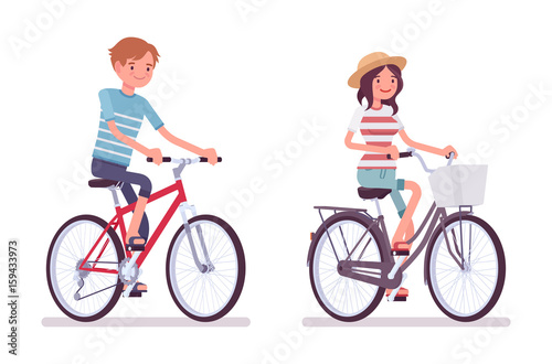 Young man and woman cycling a bike