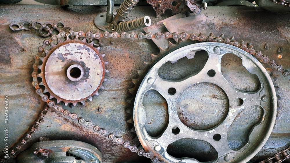 Rusty old metal mechanisms and gears in the Steam Punk style. Vintage background.