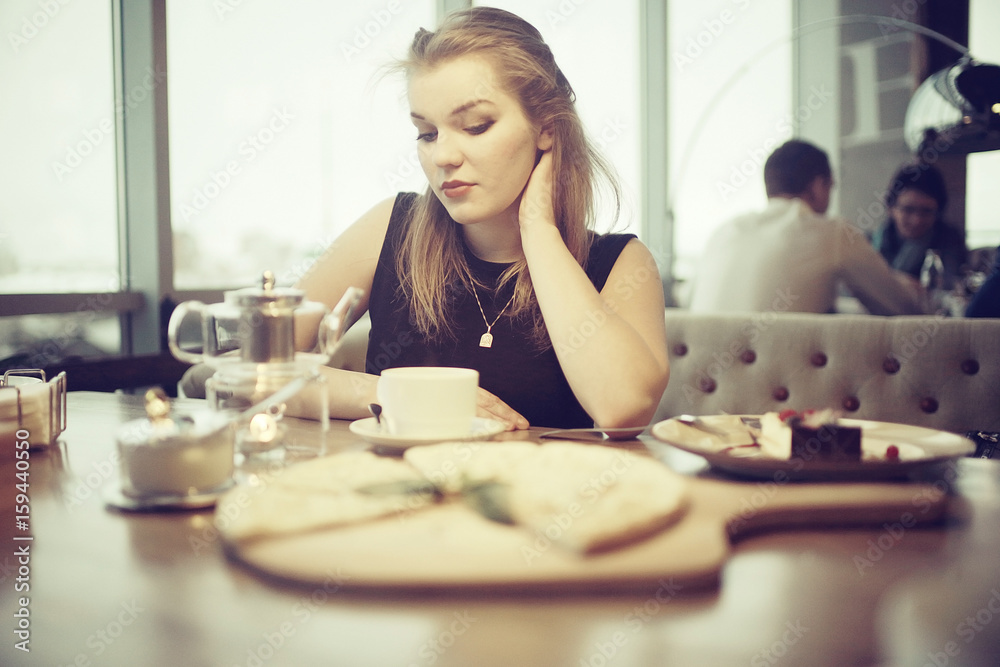 young adult girl in cafe young adult girl in cafe