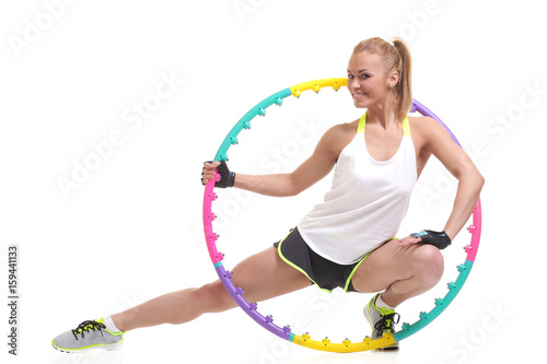 young sporty woman with hula hoop