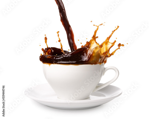 Pouring coffee into cup with splashing., Isolated on white background.