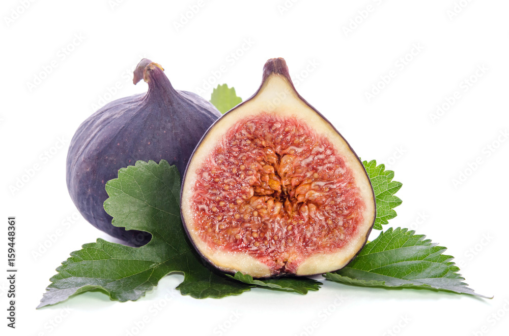 Ripe figs with leaves over white