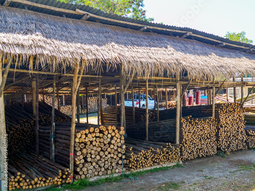 Construction materials bamboo sticks in store house photo