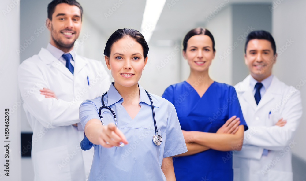 group of medics pointing finger on you at hospital