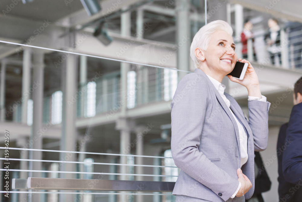 Elegant businesswoman in corporation Elegant businesswoman in corporation