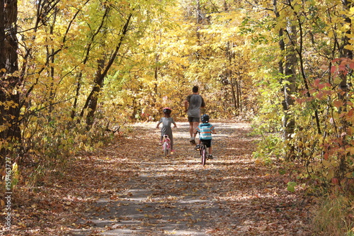 Fototapeta Naklejka Na Ścianę i Meble -  running,fall,autumn, path,biking,yellow,orange,red,brown,