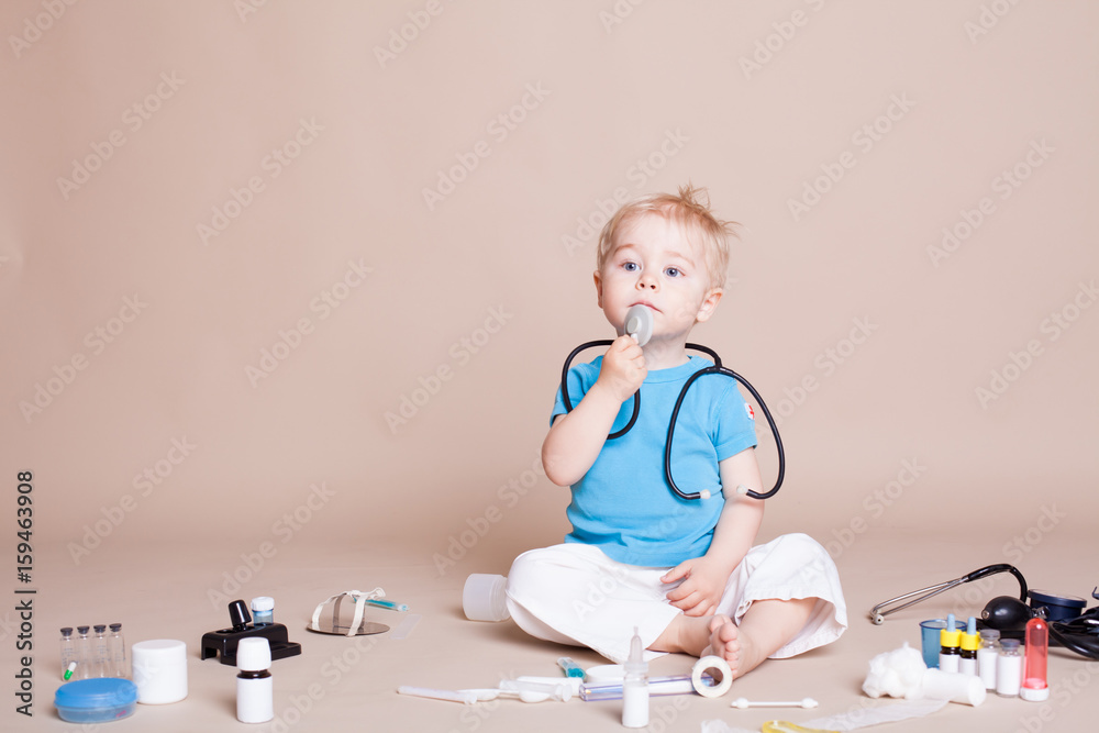 Boy playing in the doctor in the hospital