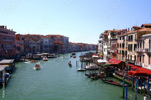 Venice is the capital of the Veneto region. It is situated across a group of 118 small islands. The city is separated by canals and linked by bridges. © Mongkhonsawat