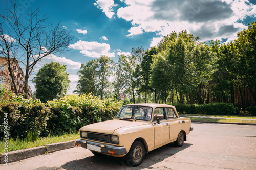 Russian Old Car Parking On Village Street In Sunny Summer Day © Grigory Bruev