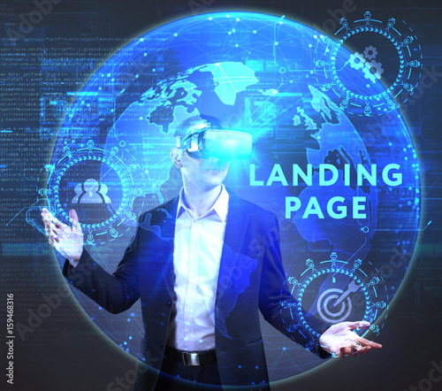 The concept of business, technology, the Internet and the network. A young entrepreneur working on a virtual screen of the future and sees the inscription: Landing page