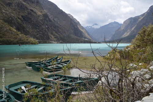 Boats in the peaceful Lake Chinancocha, District of Yungay, Ancash, Peru