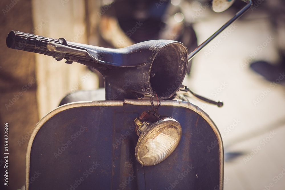 Scooter made italy with broken light | Adobe Stock