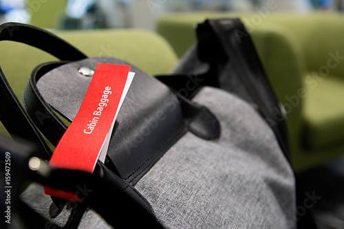 фотографія Cabin baggage tape on suitcase