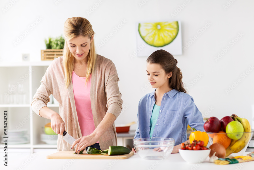 happy family cooking dinner at home kitchen